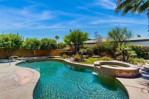 Cool off in the pool beneath wide open desert skies