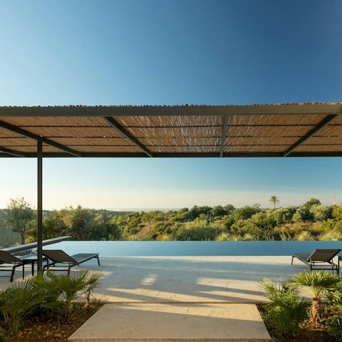 Cool off in the infinity pool, with uninterrupted views to the sea