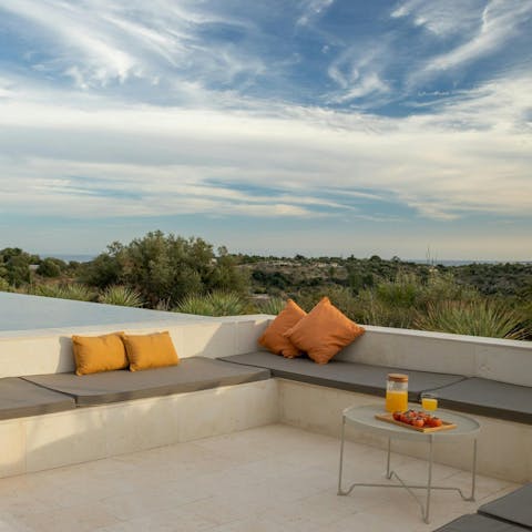 Sip sundowners in the sunken outdoor lounge