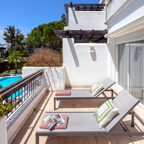Soak up the sunshine while reclining on one of the loungers