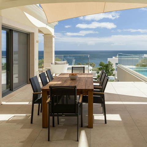 Enjoy an alfresco meal overlooking the water