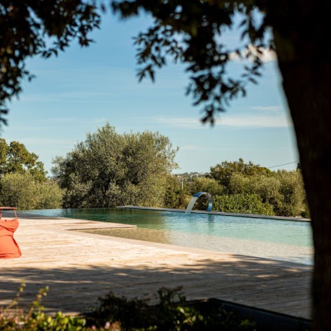 Find peace and relaxation while lounging by the pool