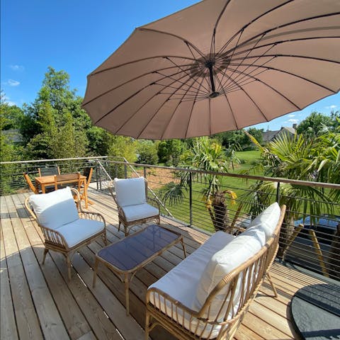 Take a coffee outside and enjoy views of the garden from the balcony