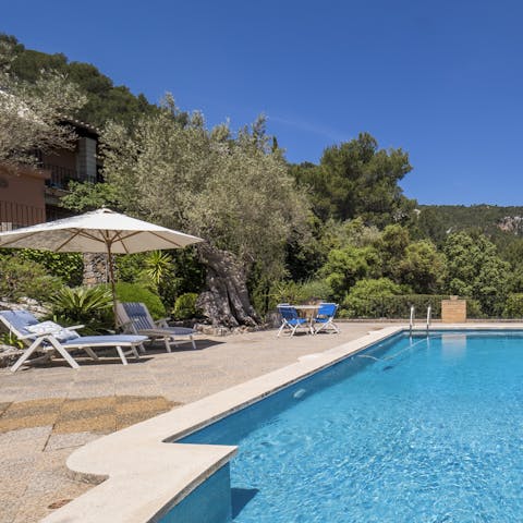 Spend seamingly endless days soaking up the sun by the pool