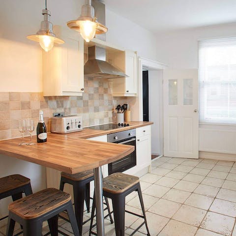 Enjoy heartwarming gatherings in the cosy kitchen