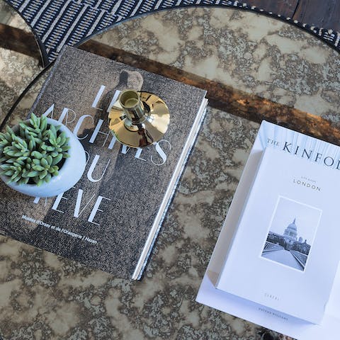 Pick one of the host's art books to read while you sip a G&T