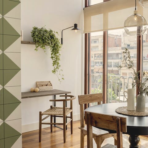 Step out to the balcony with your iced coffee after a morning at the writing desk