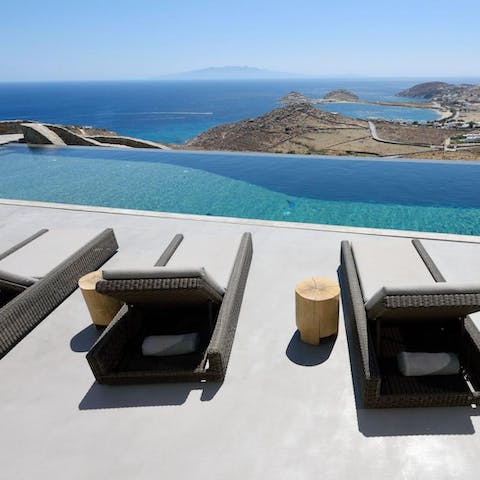 Take in the unparalleled views while comfortably lounging poolside