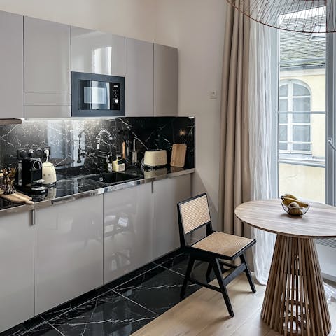 Fire up the coffee pod machine in the sleek, modern kitchen area