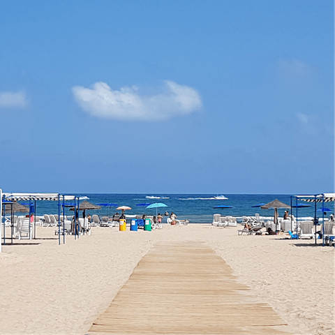 Head to Platja de Daimús for a beach day, it's a short drive away