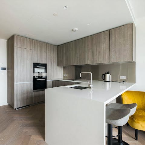 Enjoy plenty of prep space in the full kitchen thanks to the breakfast bar