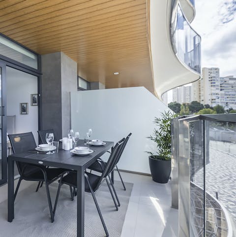 Enjoy a leisurely meal on the balcony with your nearest and dearest