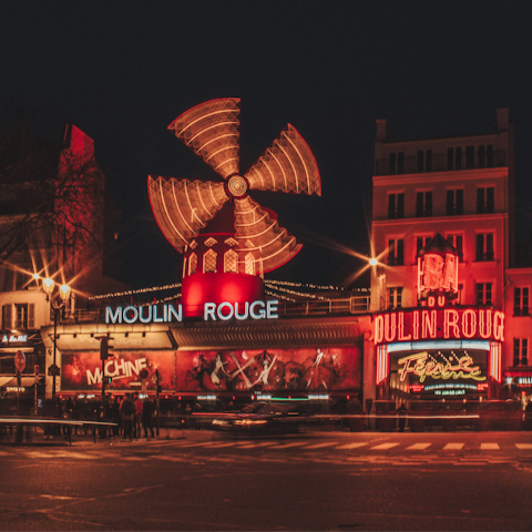 Catch a show at the iconic Moulin Rouge, located close by