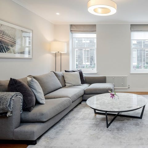 Kick back and relax on the sofa after a day exploring the capital