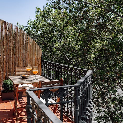 Savour refreshing drinks on the private terrace