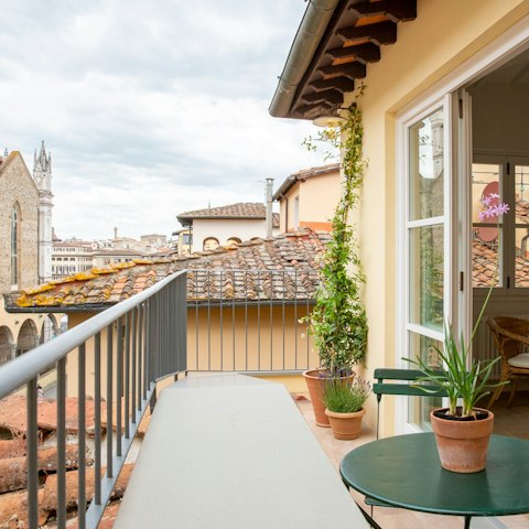 Enjoy a morning espresso out on the balcony