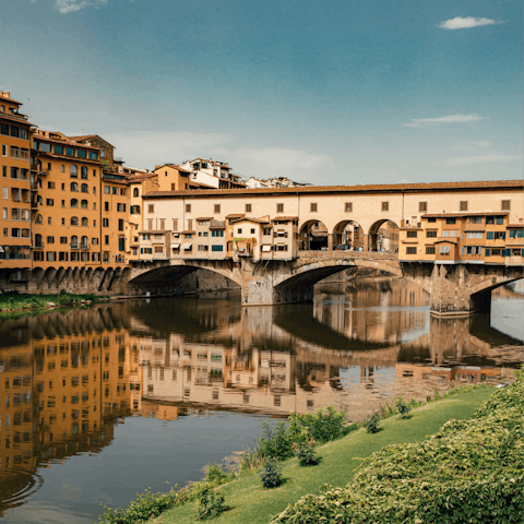 Take a fifteen minute walk along the Arno to Ponte Vecchio