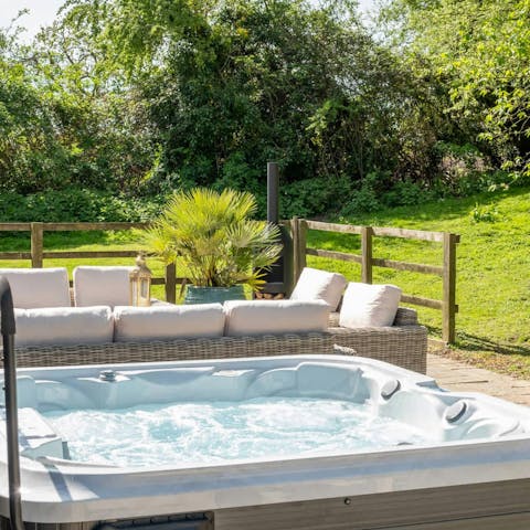 Find total relaxation while soaking in the hot tub