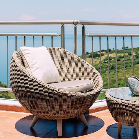 Step out onto the balcony each morning to enjoy a cup of coffee