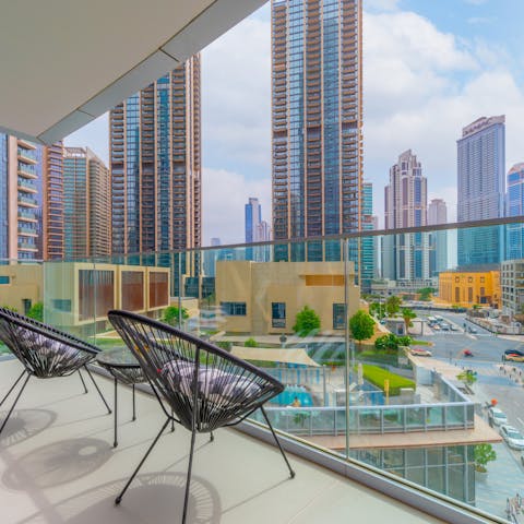Enjoy the city views from your private balcony