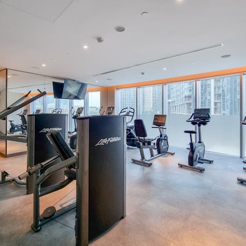 Stay on top of your fitness goals with a workout at the communal gym