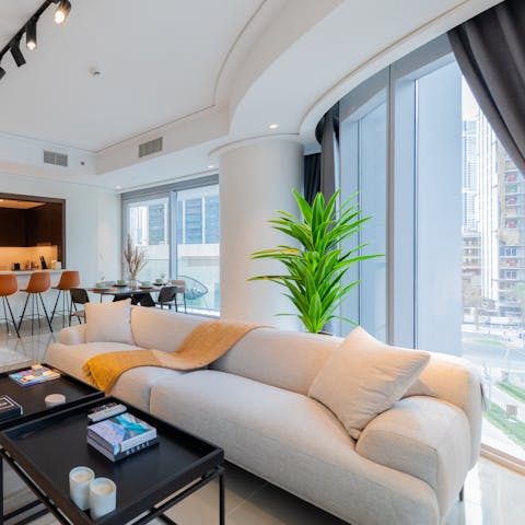 Relax and unwind in the comfy and stylish open-plan living room