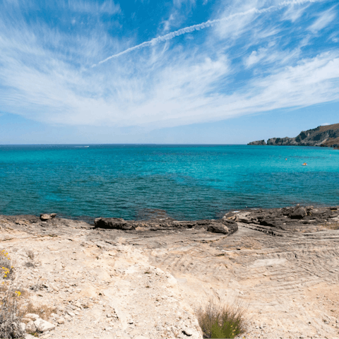 Spend the day at Sant Joan Beach, a short walk away