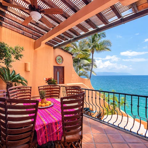 Sip margaritas on your upstairs terrace with views of Banderas Bay