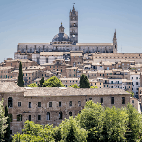 Discover the medieval city of Siena, a short drive away