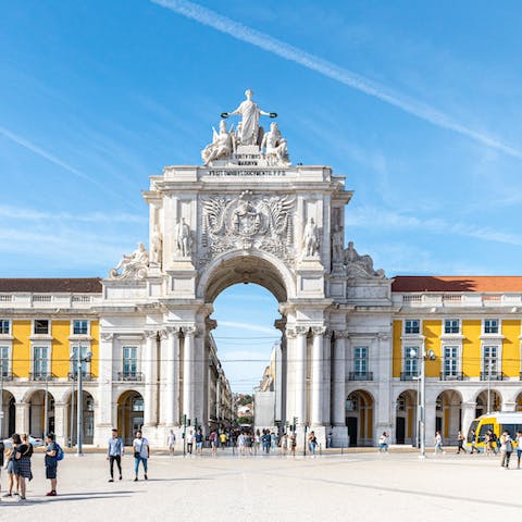 Hop on a bus down to the city's bustling Praça do Comércio