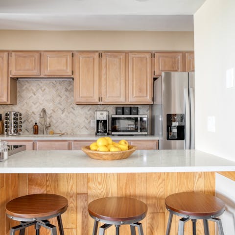 Take a seat at the kitchen island to enjoy your first coffee of the day