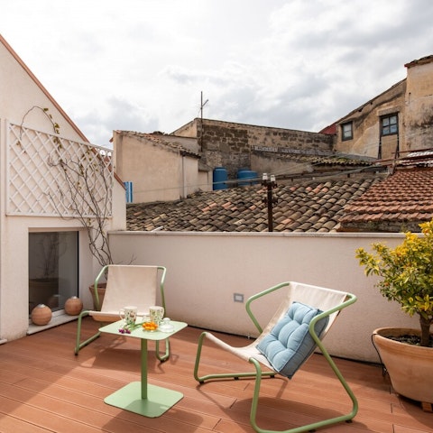 Sprawl out on the rooftop terrace with a glass of local wine