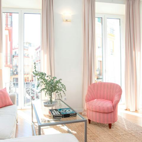 Open up the balcony doors and let the sunlight floor your elegant living room