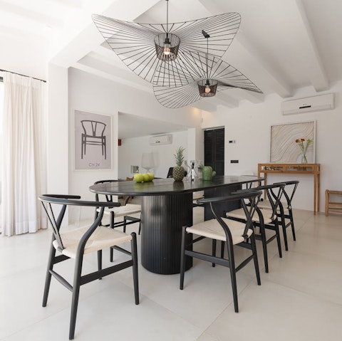 Share tapas and Spanish wine around the dining table