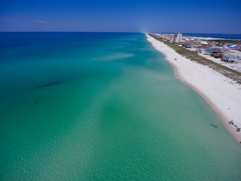 Stroll along Rosemary Beach, sixteen minutes away