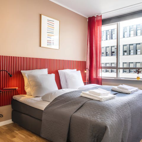 Enjoy a restful night's sleep in the modern bedroom