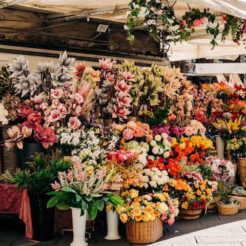 Admire the blooms at Columbia Road Flower Market – you can walk there easily