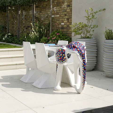 Eat outdoors in the landscaped garden on fine, sunny days