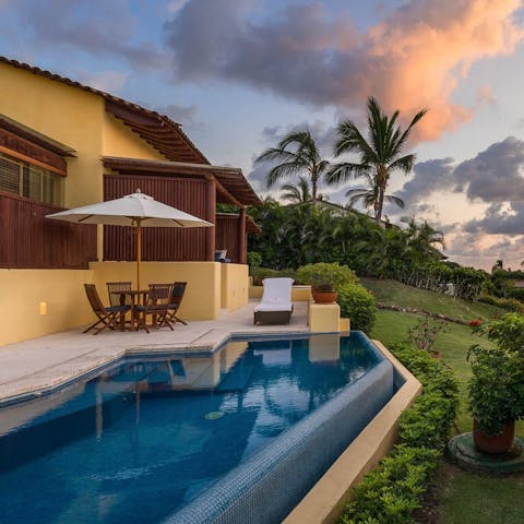 Take an evening dip in the private panoramic pool