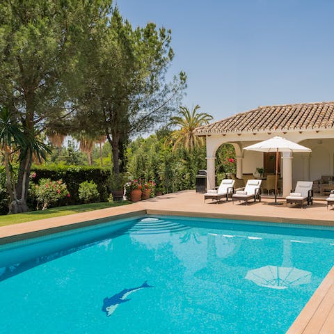 Plunge into the turquoise pool in the heat of the day