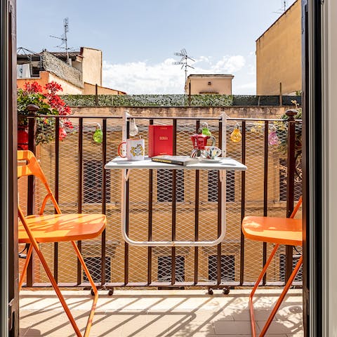 Start your day with a cup of Italian coffee out on the balcony
