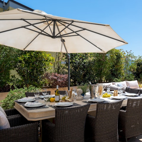 Enjoy long alfresco lunches in the shady garden dining area