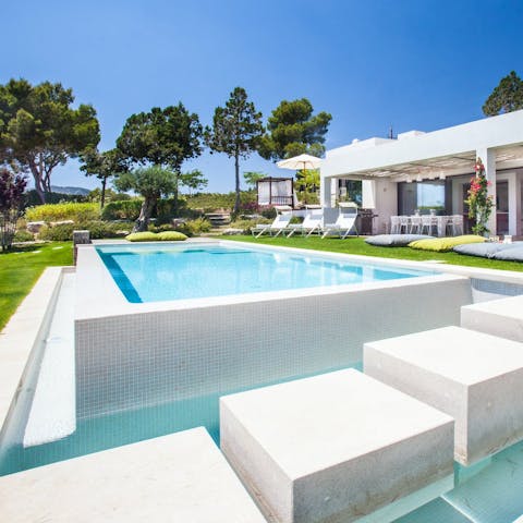 Take a refreshing dip in the generously-sized swimming pool