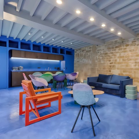 Dine together in this colourful open-plan space