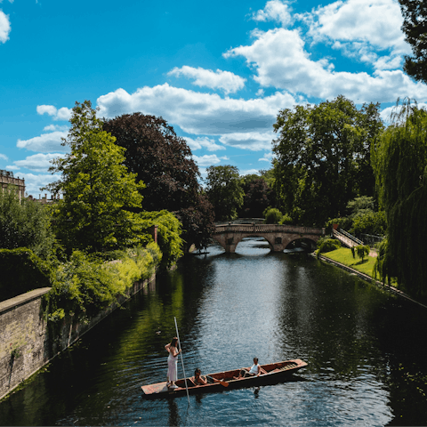 Spend a sunny day punting on the river in Cambridge
