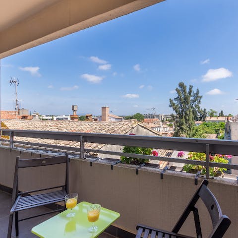 Take your morning coffee to the balcony for a brisk start to the day, overlooking the terracotta tiled roofs