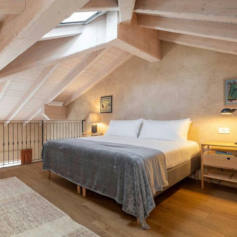 Settle down to sleep, surrounded by the farmhouse's original vaulted ceilings