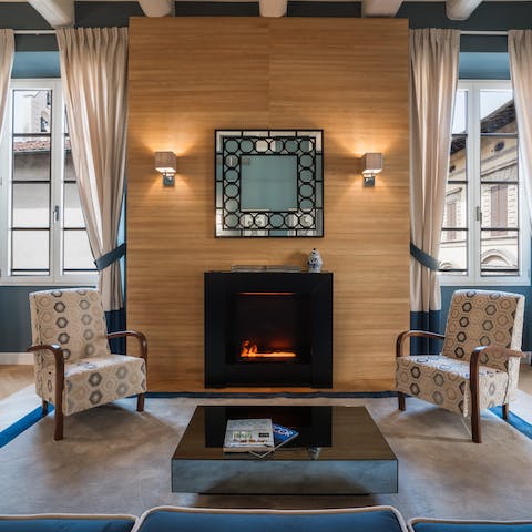 Feel inspired by the regal presence of the living room with views across Piazza del Duomo