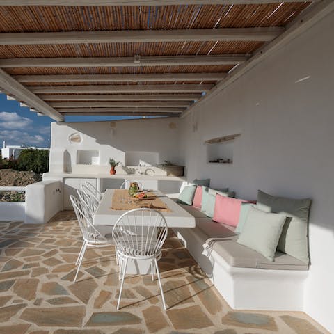 Feast on local olives and goat's cheese on the pretty terrace