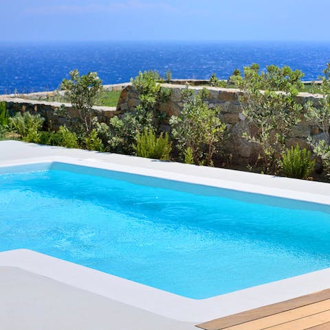 Swim in an infinity pool dotted with greens